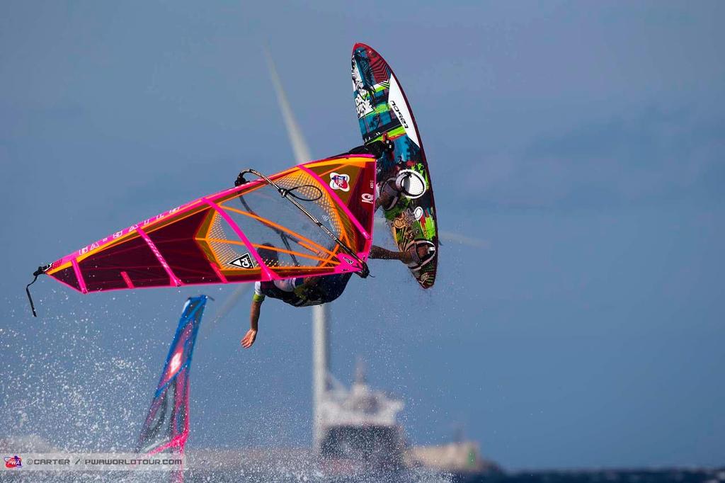 Thomas Traversa one handed backie - 2014 PWA Pozo World Cup / Gran Canaria Wind and Waves Festival ©  Carter/pwaworldtour.com http://www.pwaworldtour.com/